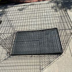 Black metal dog cage/pen