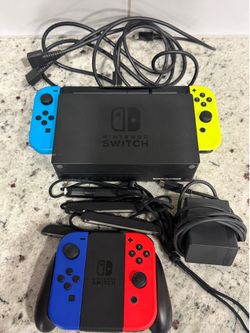 Nintendo Switch and 2 controllers