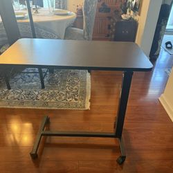 Drive Non-Tilt Overbed Table Gently used, excellent condition. 	•	Chrome or Silver Vein base 	•	Adjustable height: 28”–45” 	•	40 lb weight capacity 	•