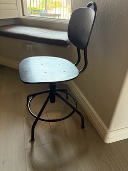 Black wood swivel desk chair from IKEA