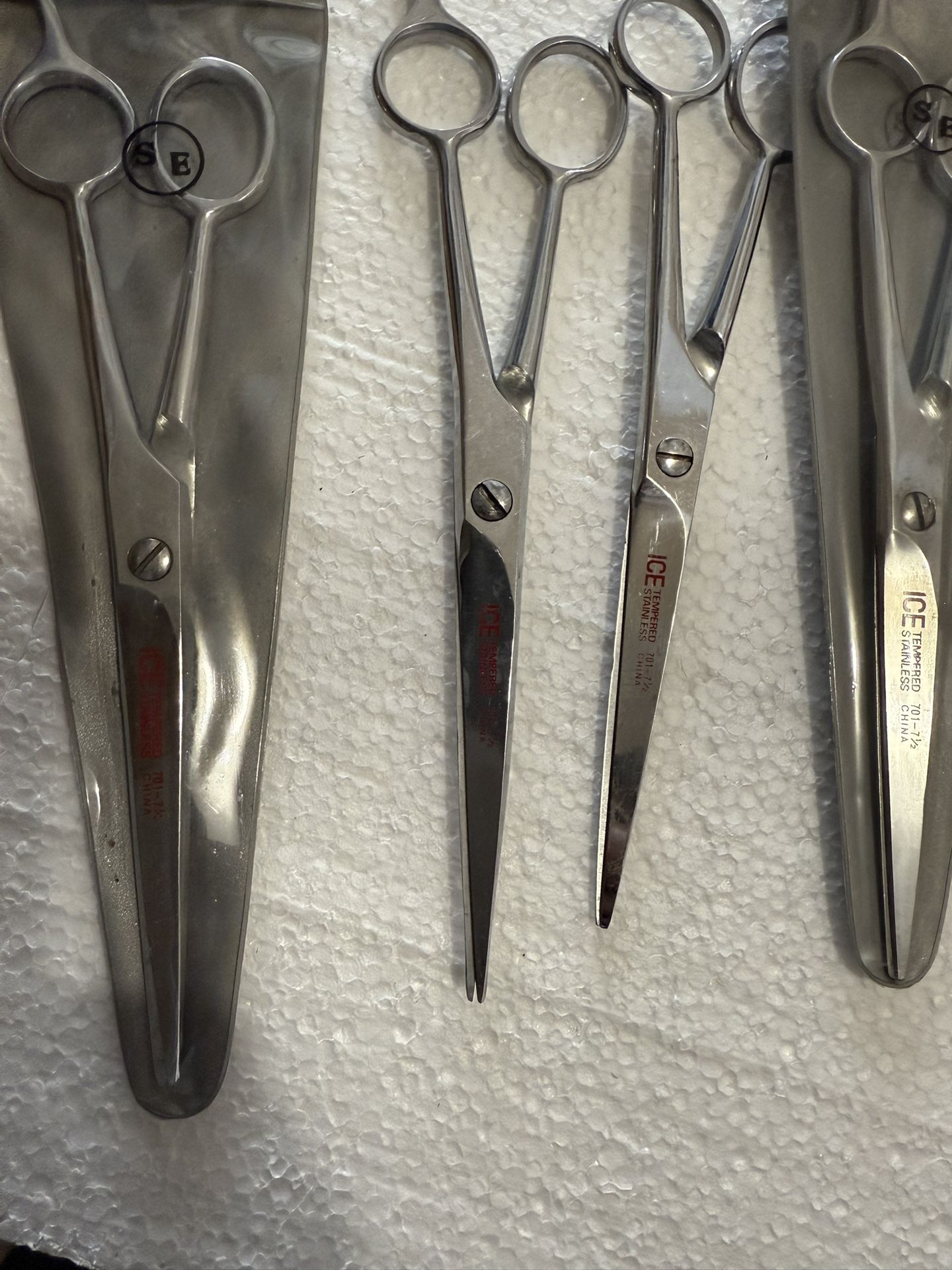 assorted ICE Tampered stainless scissors plus 1 SONA scissor for sale. All are brand new. Asking Price Is $100.00
