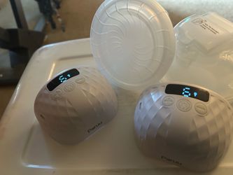 Portable breast pumps