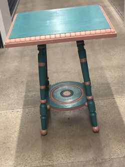Antique hand painted antique table 43 tall 53 wide