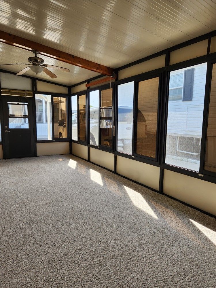 MANUFACTURED HOME AND PERIMETER LOT IN HOLIDAY CONDO PARK (16410 SAN CARLOS BLVD.)