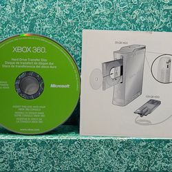Xbox 360 Hard Drive Transfer Disc Only W/Original Sleeve With Printed Diagram On it.
This item is an official Xbox 360 Hard Drive Transfer Disc produc