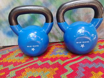 PAIR  OF  50  LB.  KETTLEBELLS