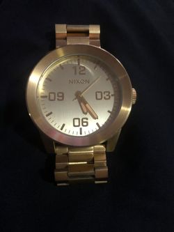 Gold Nixon watch