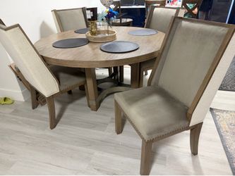 Chrestner Dining Round table with Chairs