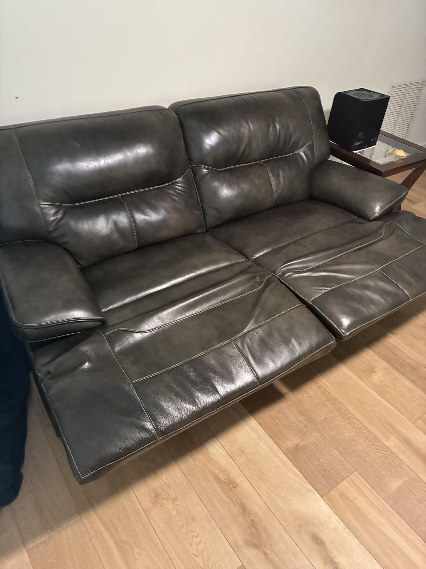Comfortable leather couch with 2 recliners