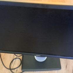 The image shows a Dell P-series monitor, likely models such as the P2419H, P1913, or the UltraSharp U2713HM.  