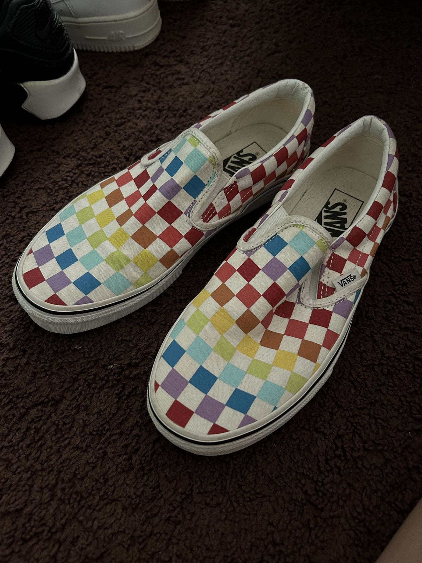 Slip on checkered rainbow vans