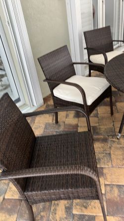 Rattan table and 4 chairs
