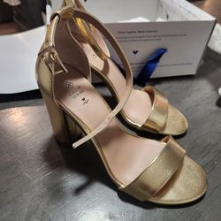 Woman's Gold Heels