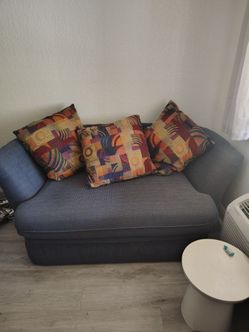 Gray Fabric Chaise Lounge with Throw Pillows