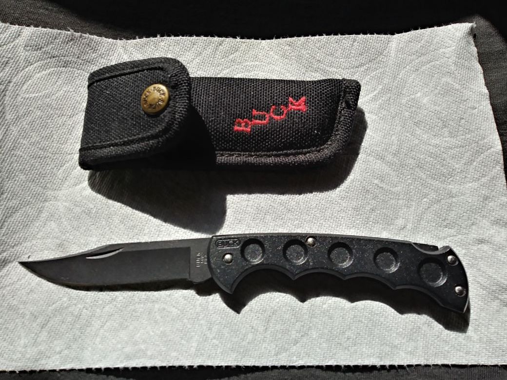 Rare BUCK Titanium Model 560 knife and sheath