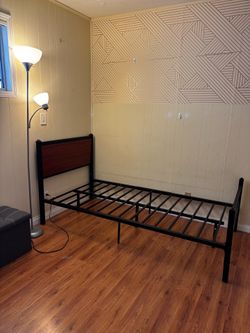 Twin size bed frame - wooden headboard