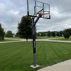 Goaliath 60 inch in ground basketball hoop, adjustable basketball court 