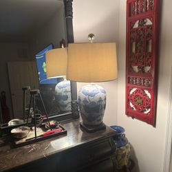 Blue and White Porcelain Lamp –  Beautiful blue and white hand-painted porcelain lamp with a solid wooden base. Excellent condition. Features a 3-way 