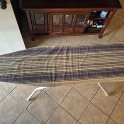 Padded Strong Ironing Board.  This Board Is Light But Not Cheaply Made Good Quality. 