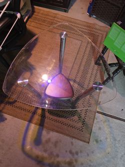 Glass end table with wood bottom 25 dollars