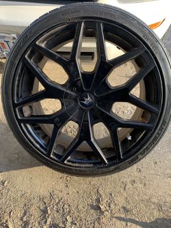 Mazzi 20in black rims with tires