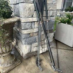 Assorted Golf Clubs