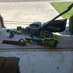 Bunch Of Ryobi Yard Equipment With Lawn Mower