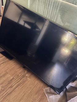 TV with remote and wall mount