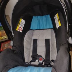 Two Car Seats And One Stroller 