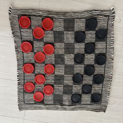 27” checkers fabric game  with 12 red and black 3” plastic pieces