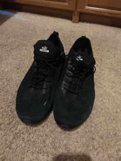 Nike Revolution 7  “Triple Black”