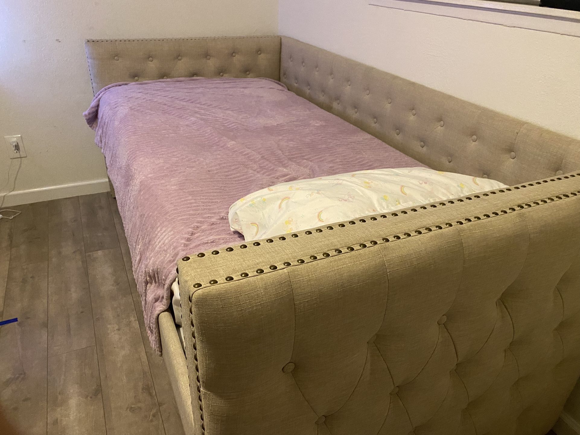 Upholstered Twin Bed With Trundle
