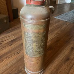 Brass antique fire extinguisher