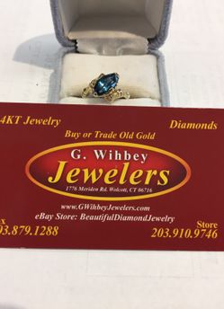 14 Kt real gold & Topaz ring