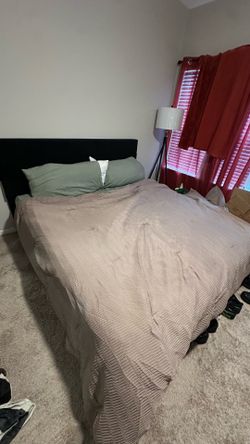 Black king bed frame and mattress