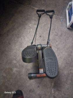 Niceday compact home stair stepper with resistance bands for full-body cardiovascular workouts.