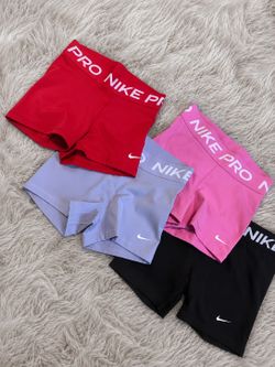 Nike Pro shorts bundle in red, pink, blue, and black