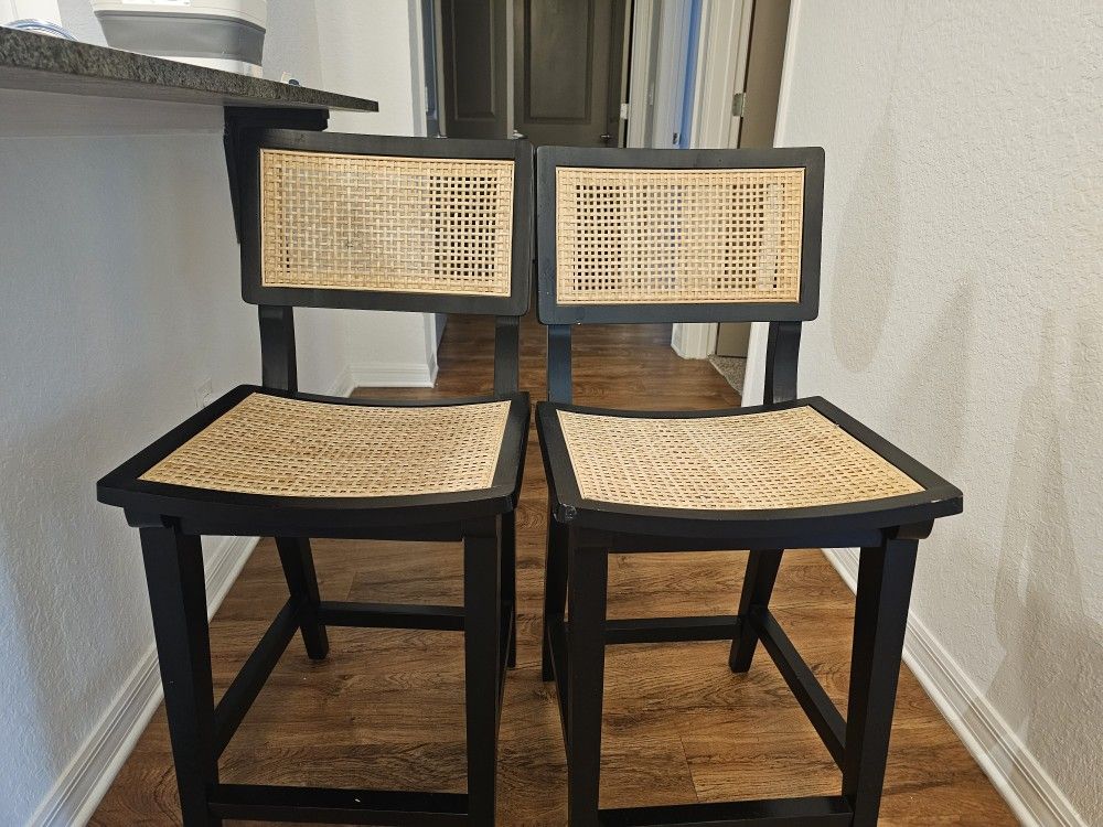 Black And Wicker Stools.