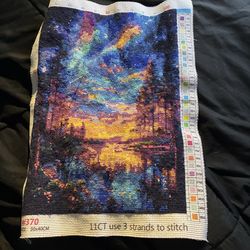 Hand stitched needle point galaxy scenery