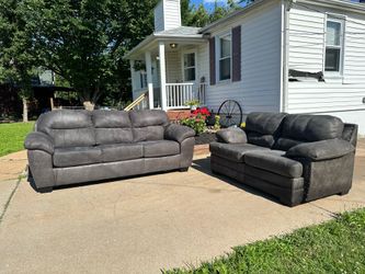Gray couch and loveseat