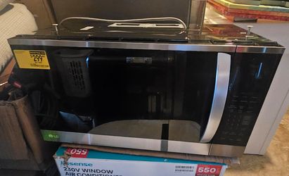 LG STAINLESS STEEL MICROWAVE OVER THE COUNTER....MISSING MOUNT BRACKET....$ 150