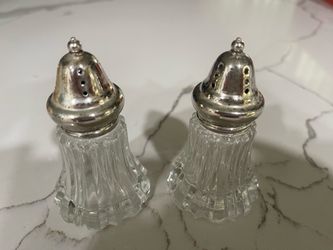 Glass Salt and Pepper Shakers with Silver Tops