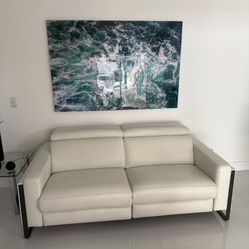 White Real Leather/Vinyl Power Reclining Sofa Loveseat Excellent Condition. Adjustable Headrest / Footrest. Dimensions: 83W x 33H x 43.5L. Was $2,400