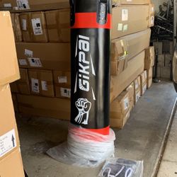 Gikpa Punching  bag Four Feet Tall 75 Pounds including gloves bendges