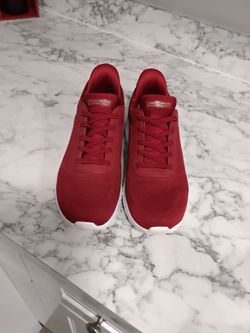 Red sketchers slip in, size 9.