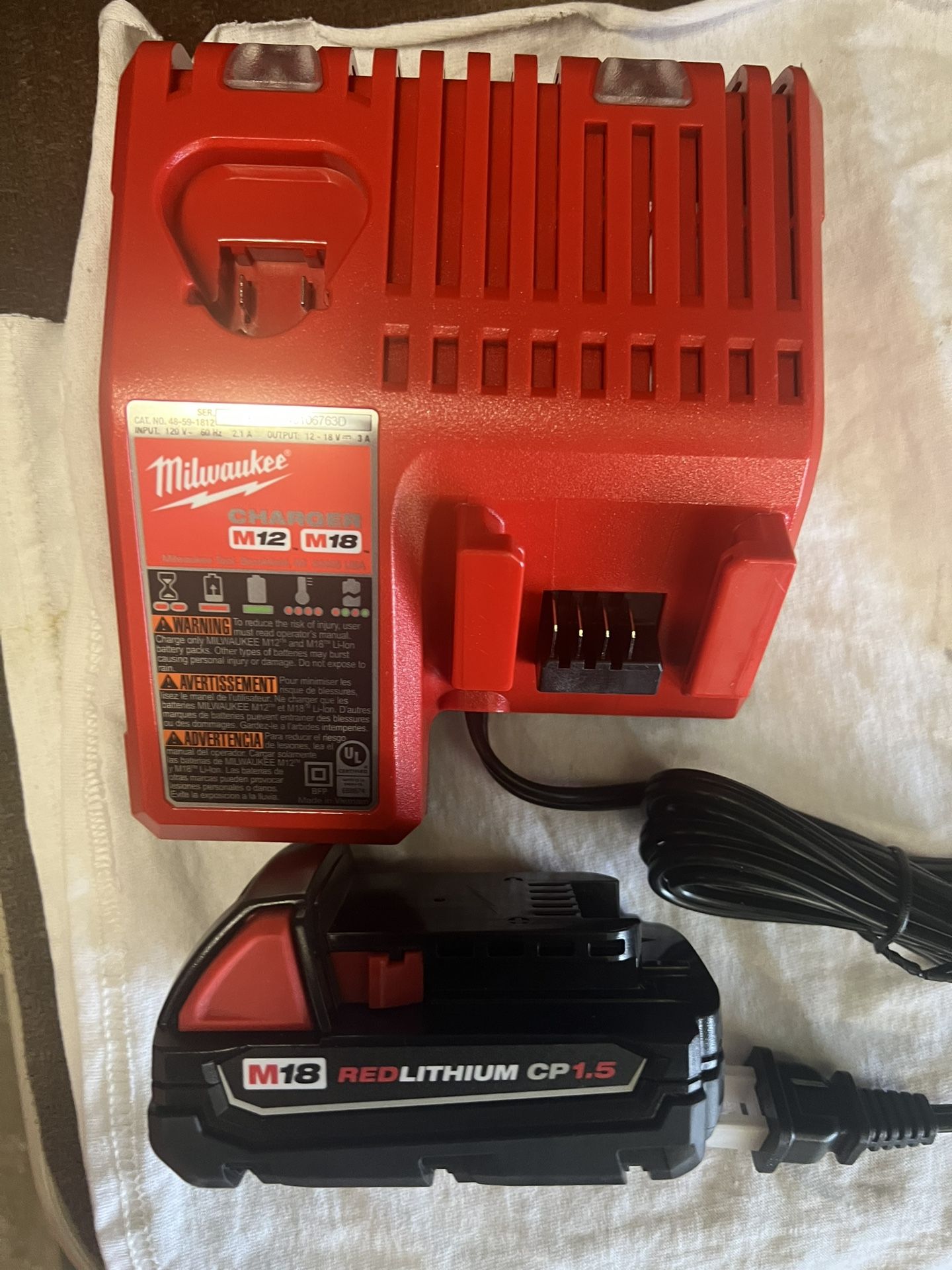 Milwaukee Charger And Battery M18 RED Lithium CP 1.5 Brand New