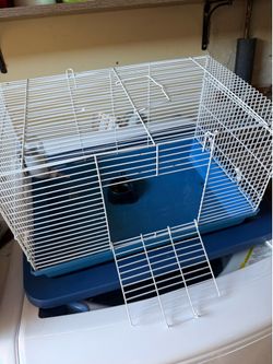 Small cage with water bottle