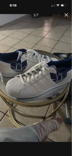 Blue and white Adidas sneakers