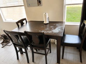 Dark brown table and chairs