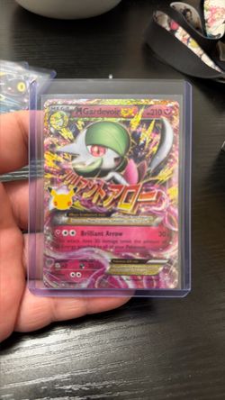 Mega Gardevoir EX Pokémon Card in Case